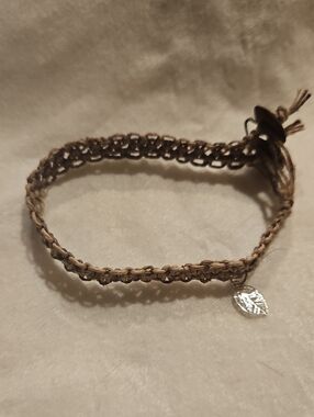 Handwoven Brown Hemp Bracelet with Silver Leaf Charm